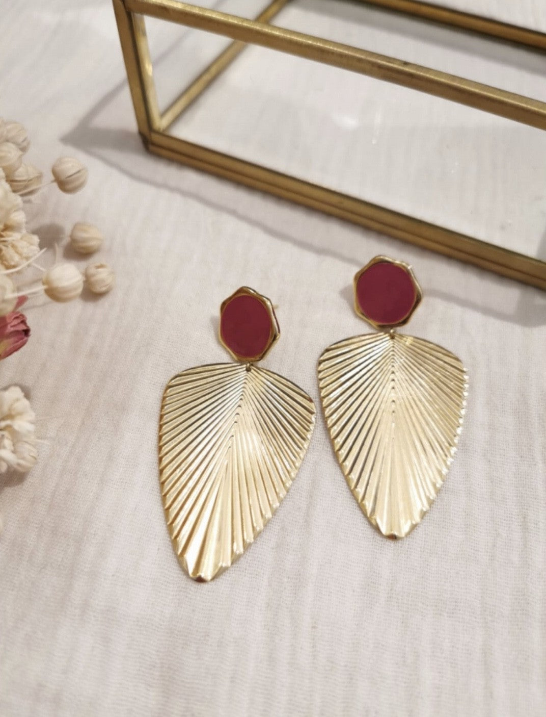 Boucles d’oreilles triangle fuchsia